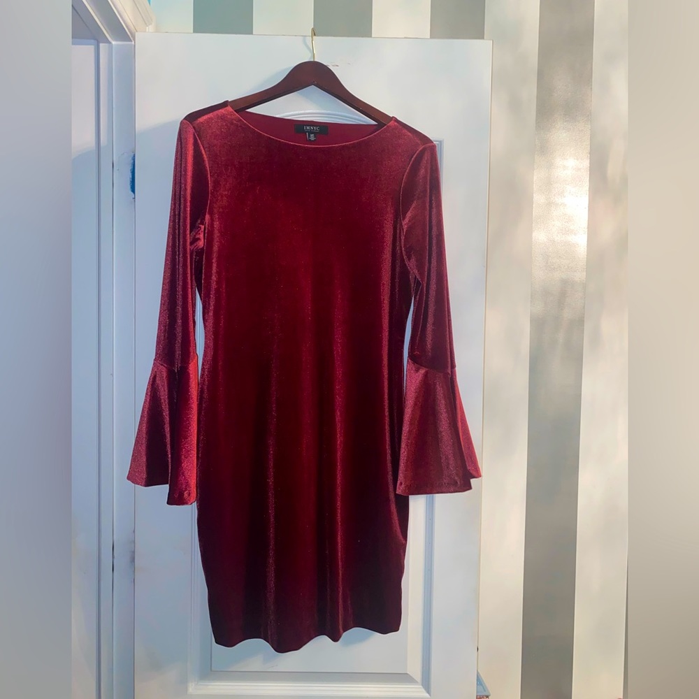 Burgundy velvet dress with sleeves. Excellent condition. Only worn once.